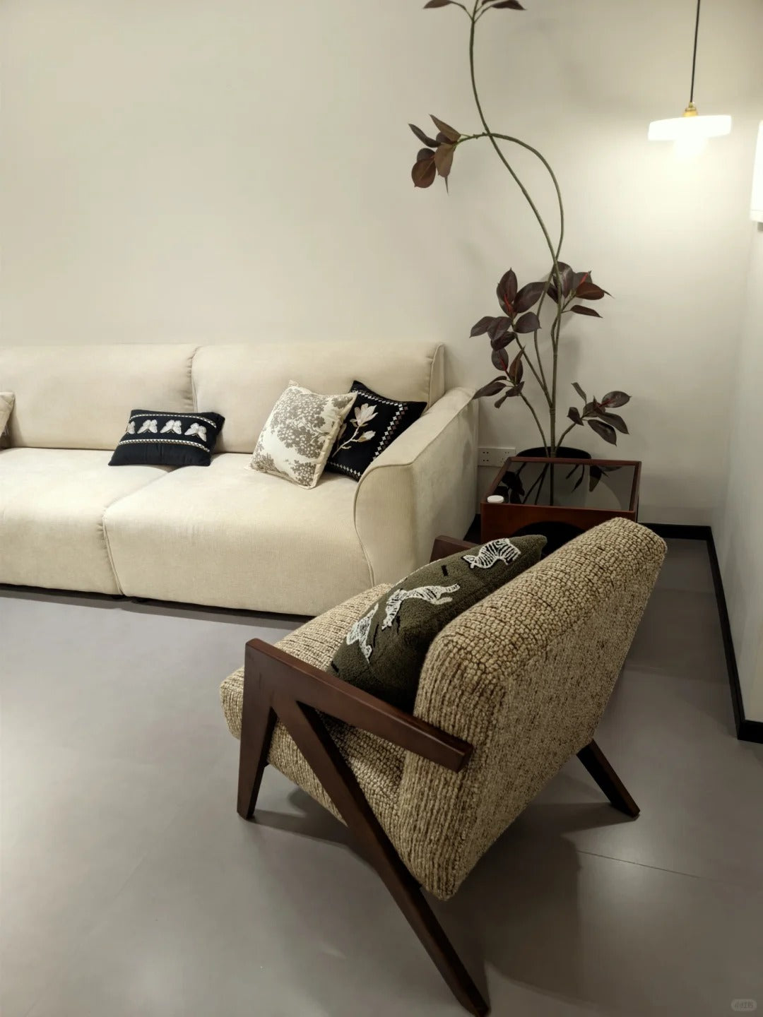 Cuddlewood Textured Upholstered Accent Chair with Angled Wooden Frame