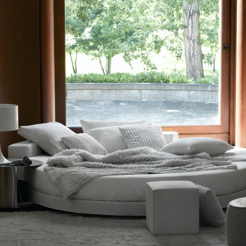 Cuddlewood Serene Sanctuary: A Round Upholstered Bed for Ultimate Relaxation