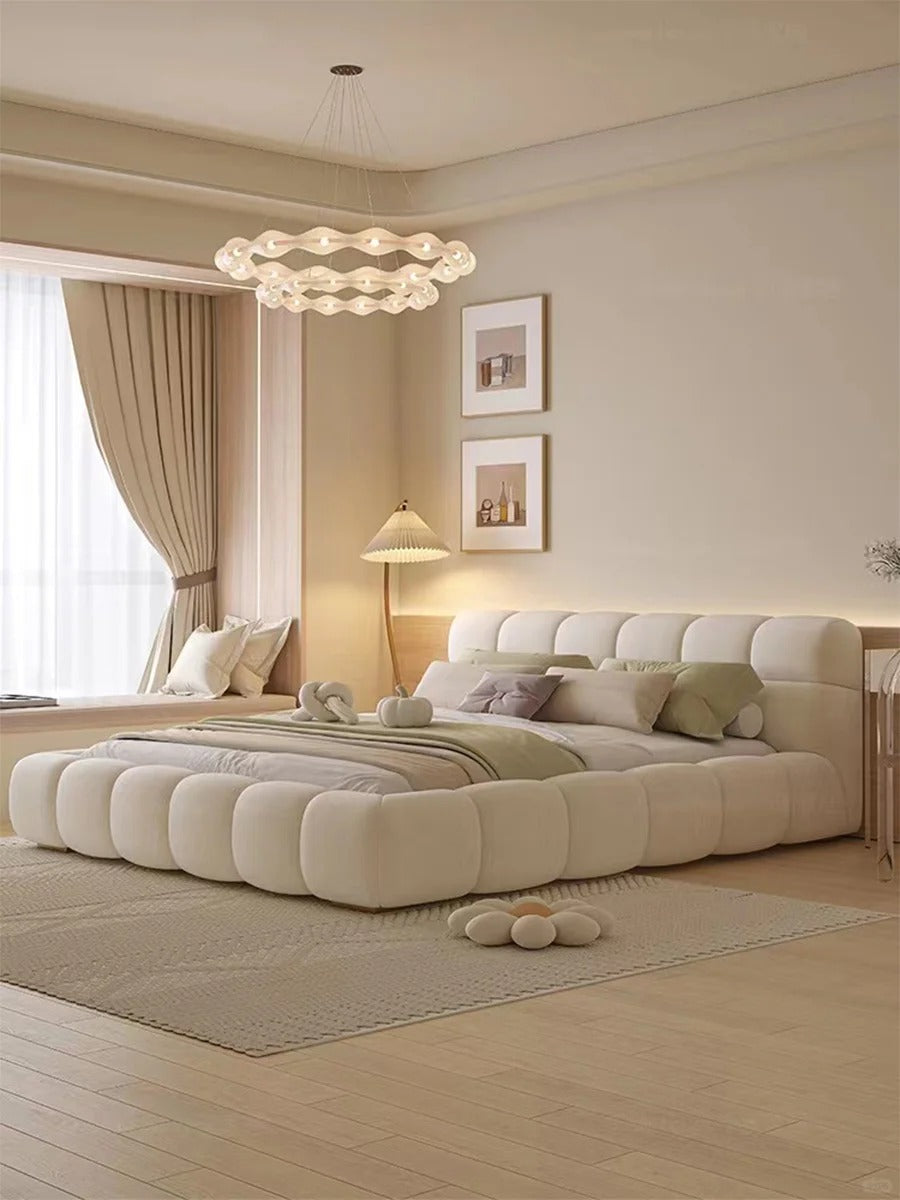 Cuddlewood Luxurious Upholstered Bed with Plush Cushions and Elegant Design